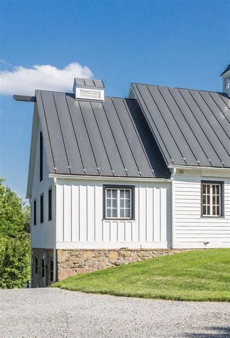 white siding house with metal roof|white house with metal roof.